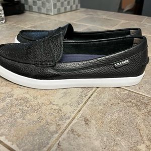 Coke Haan slip on loafers.